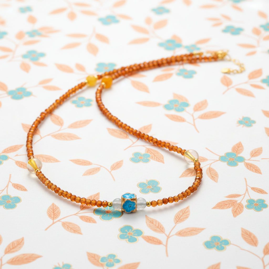 GARNET WITH ENAMEL FOCAL POINT FIRST LAYER NECKLACE