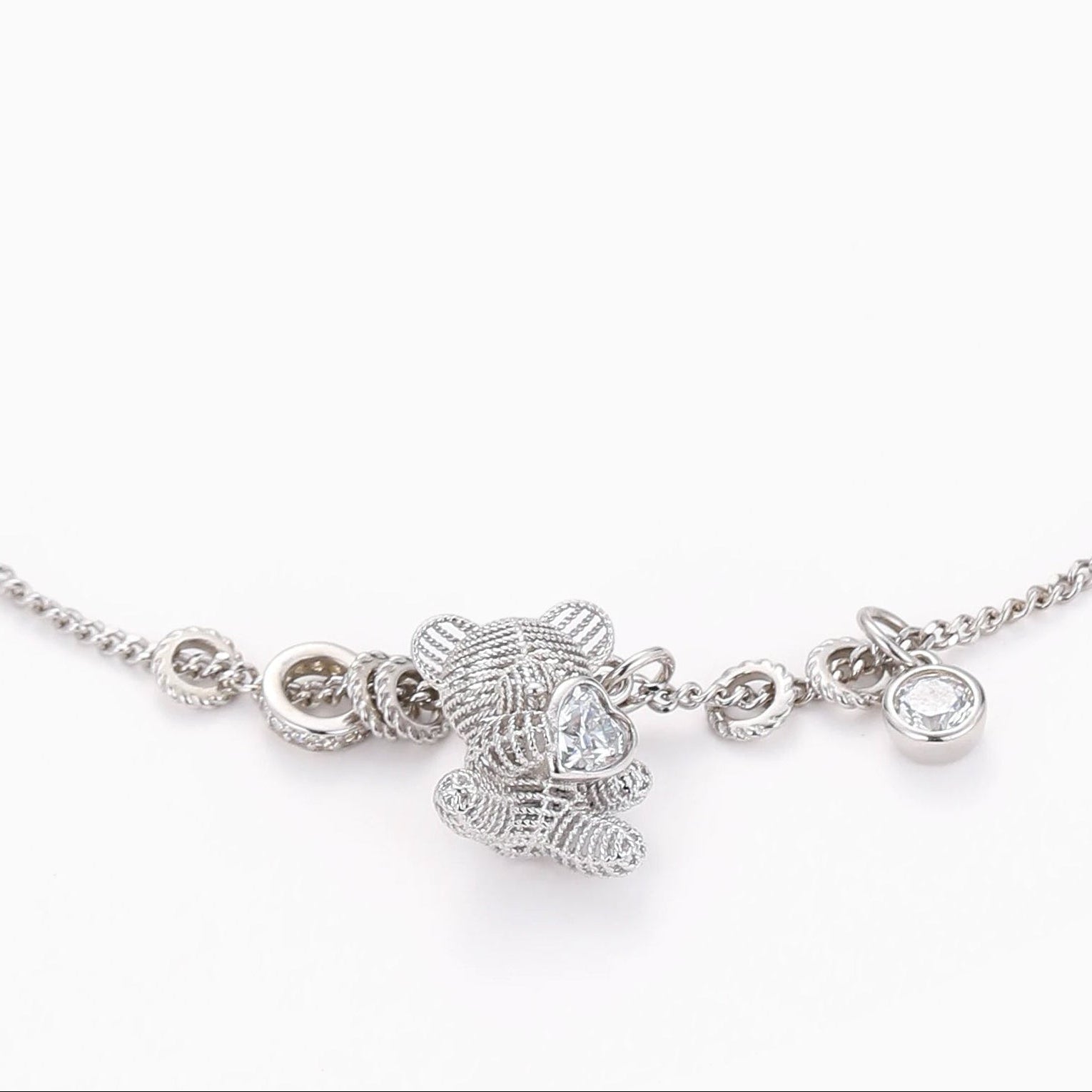 A TENDER EMBRACE TEDDY BEAR PENDANT NECKLACE WITH HEART CZ IN STERLING SILVER