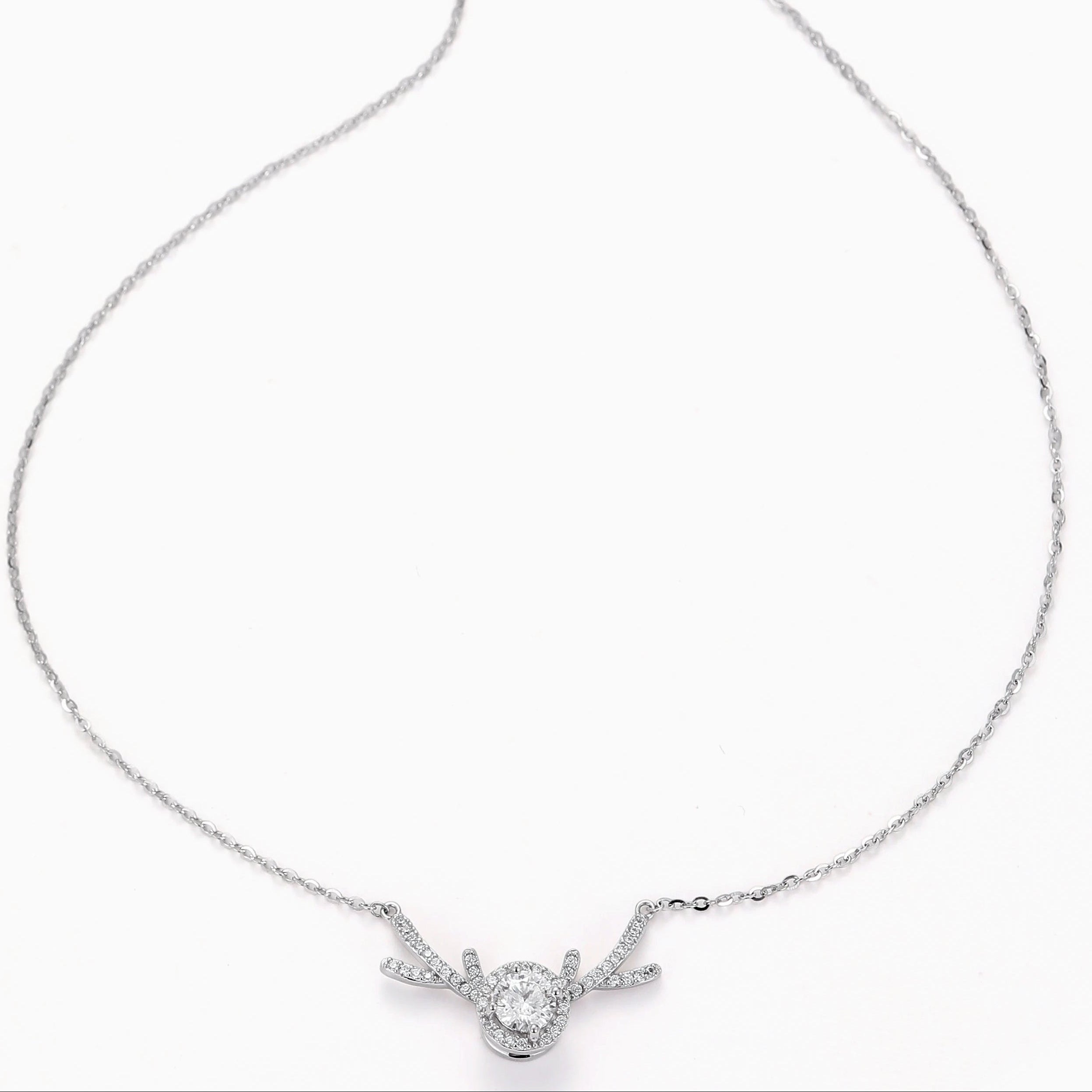 SPINNING MOISSANITE PENDANT NECKLACE WITH DEER ANTLER DETAILING