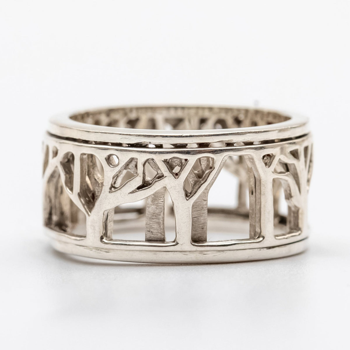 LADY IN NATURE SILVER MEDITATION SPINNER RING, FOREST CUTOUT DESIGN