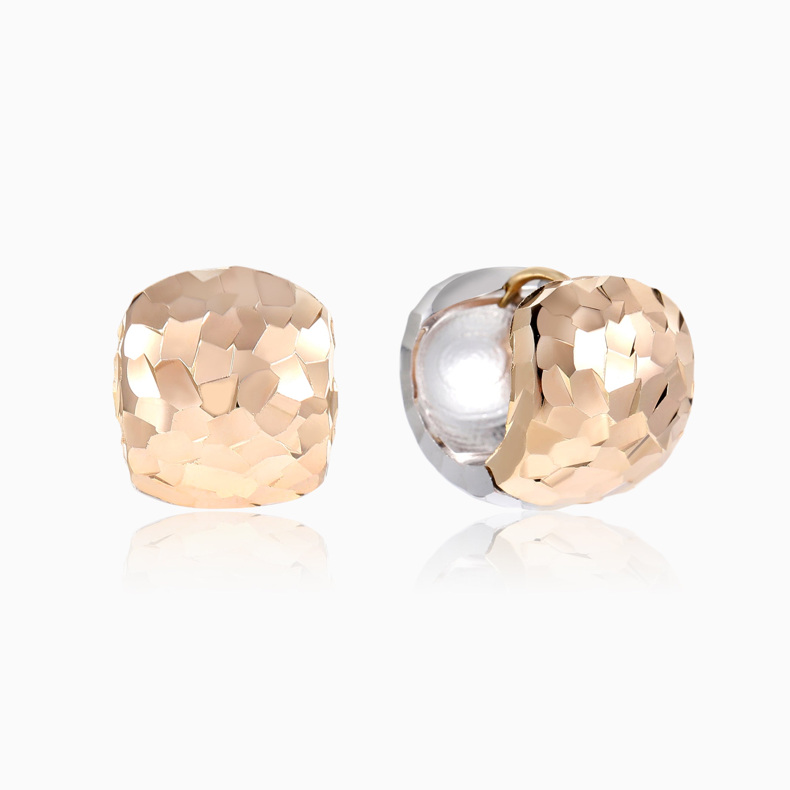 SILVER MEETS GOLD IN HAMMERED HUGGIE HOOPS