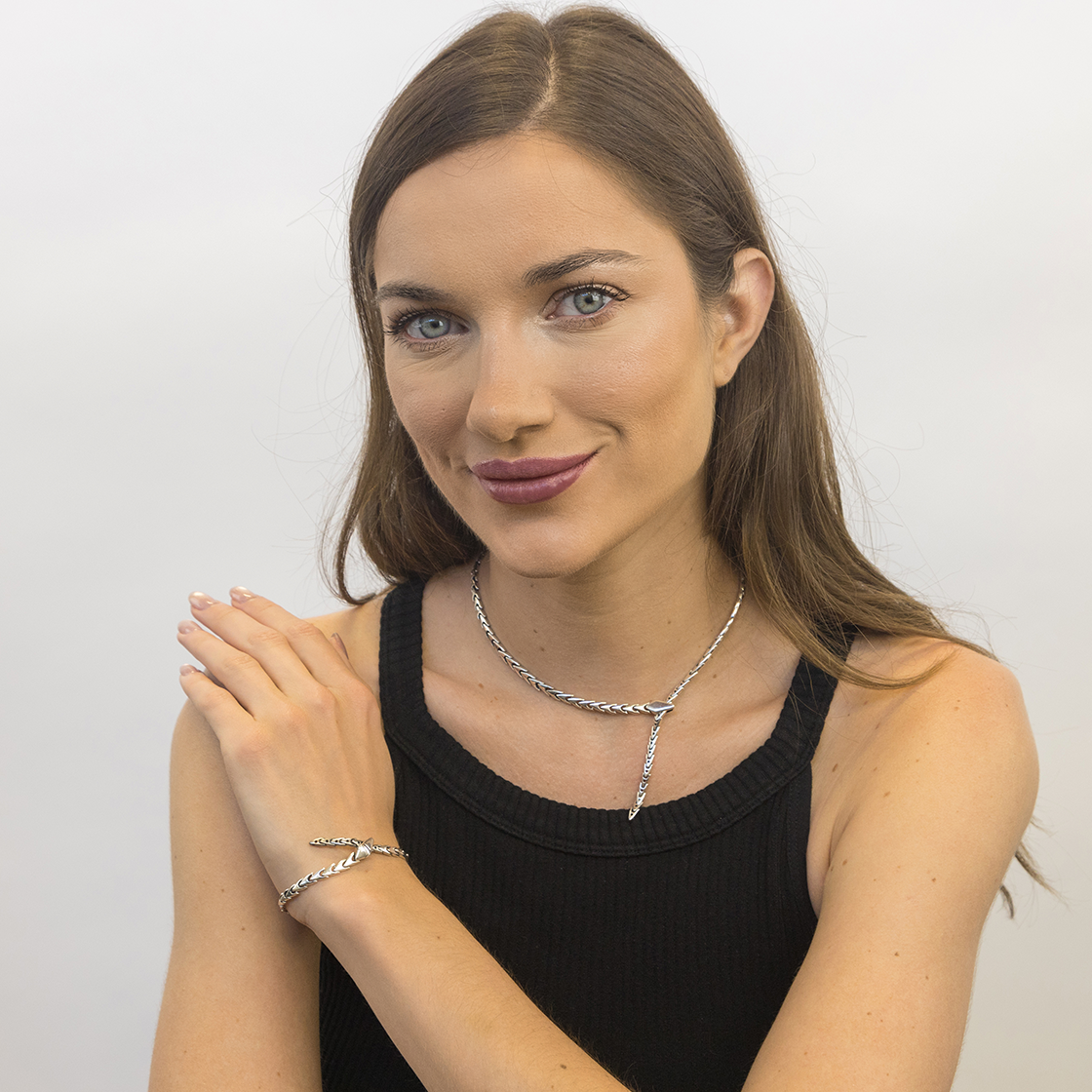  S925 Sterling Silver Snake Bracelet worn on wrist, an edgy retro unisex jewelry piece