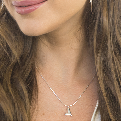 Heart necklace worn showing length and elegant design