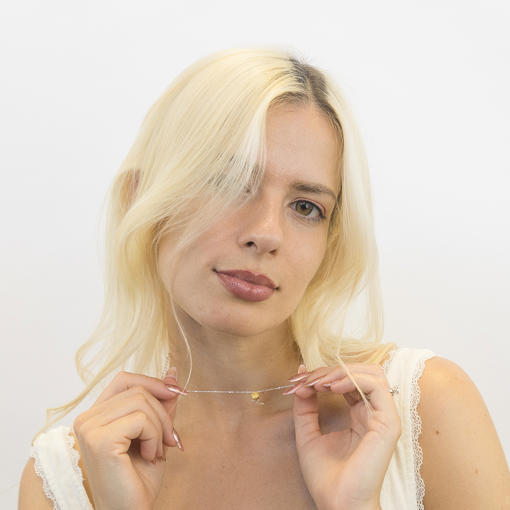 Rose necklace worn showing two-tone design elegance