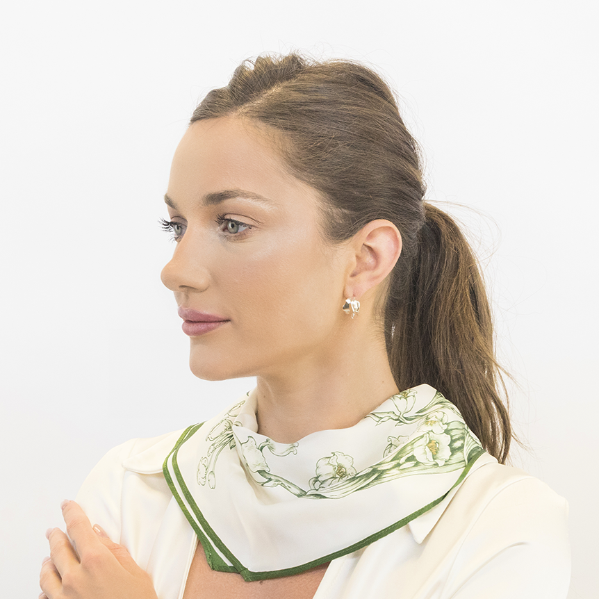 Modern organic earrings worn showing lightweight structure